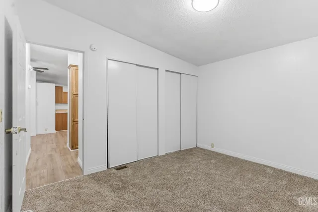 an empty room with closet