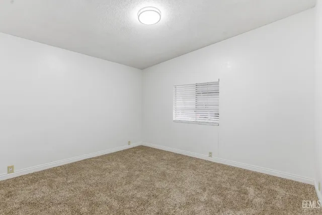 an empty room with a workbench