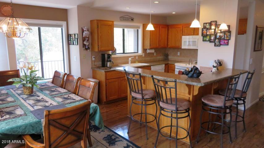 1402 North Sunset Drive Payson, AZ 85541 - Photo 12 of 28 Breakfast bar and dining