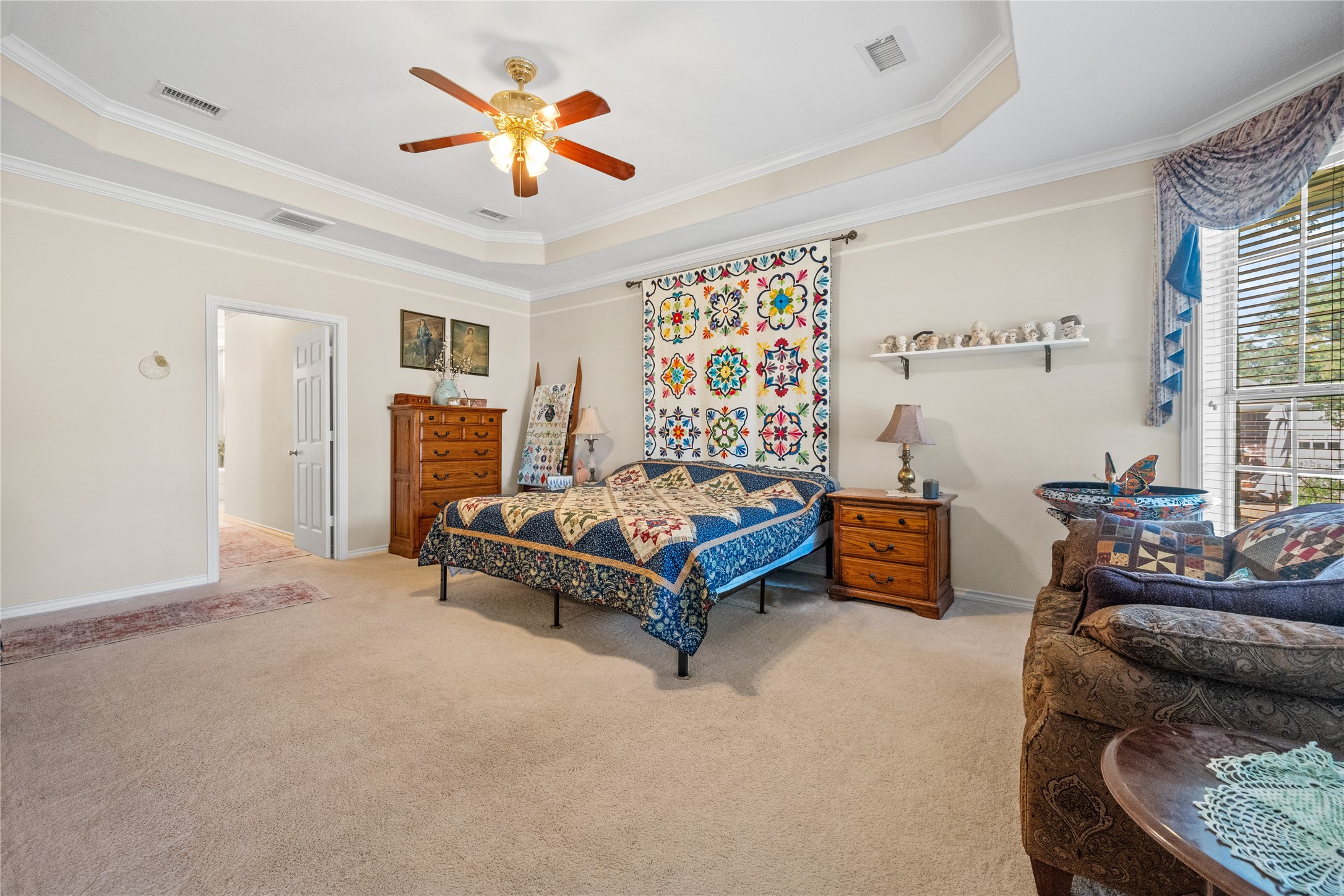 319 Palais Verde Road Montgomery, TX 77356 - Photo 17 of 39 a bedroom with furniture and a chandelier