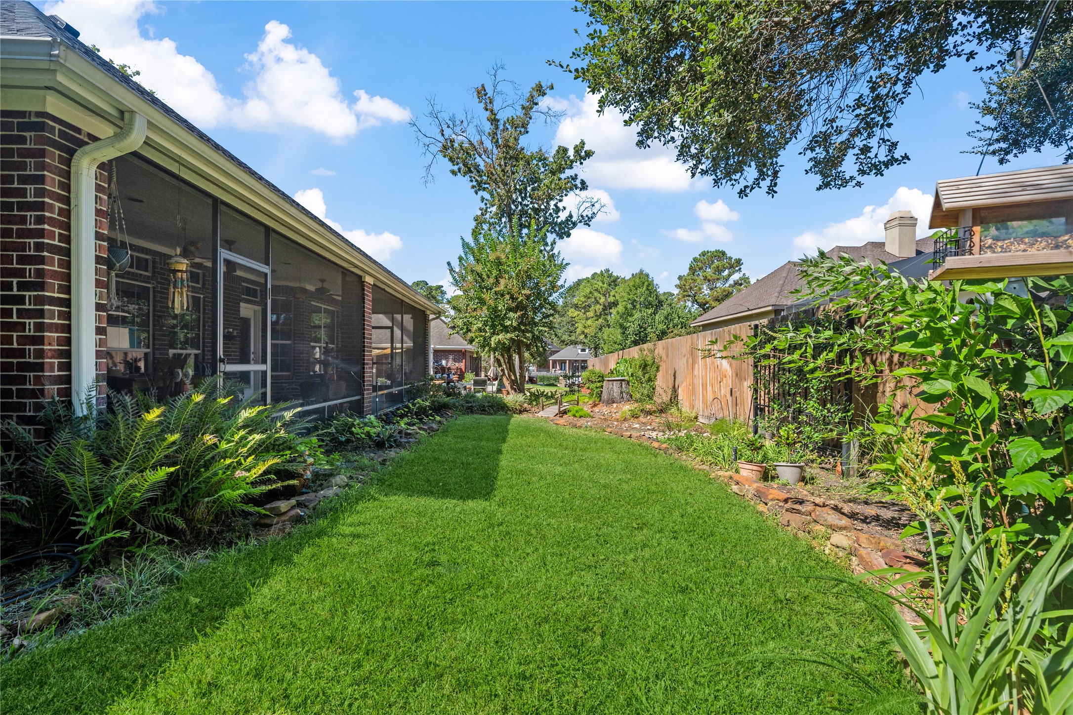 319 Palais Verde Road Montgomery, TX 77356 - Photo 29 of 39 a view of a back yard with flower plants