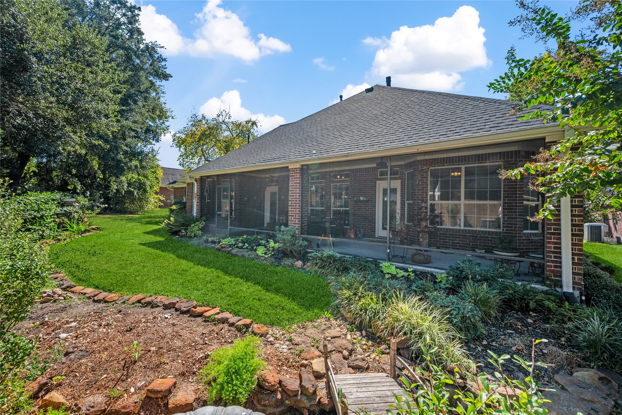 319 Palais Verde Road Montgomery, TX 77356 - Photo 30 of 39 a view of a house with a garden