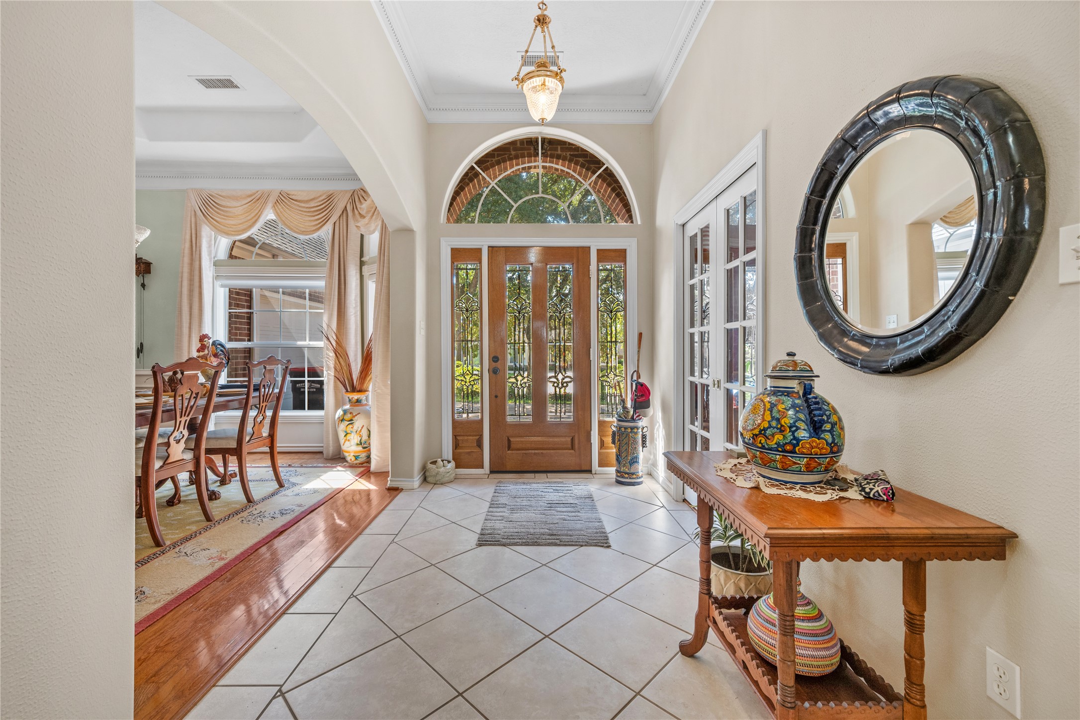 319 Palais Verde Road Montgomery, TX 77356 - Photo 5 of 39 a dining room with furniture and a chandelier