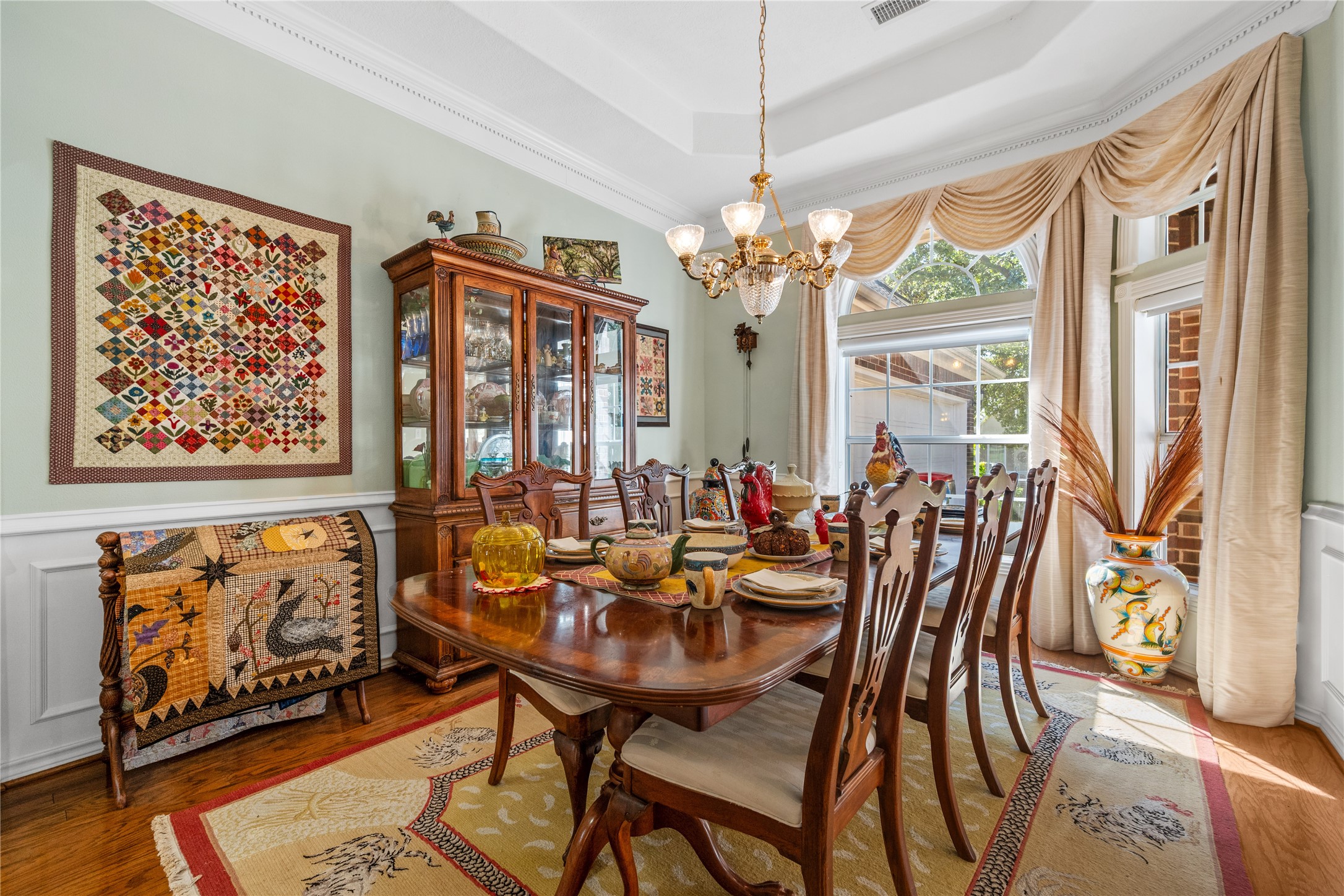 319 Palais Verde Road Montgomery, TX 77356 - Photo 7 of 39 a view of a dining room with furniture wooden floor and chandelier