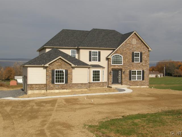 233 East Dell Road Bath, PA 18014 - Photo 1 of 13 a front view of a house with a yard