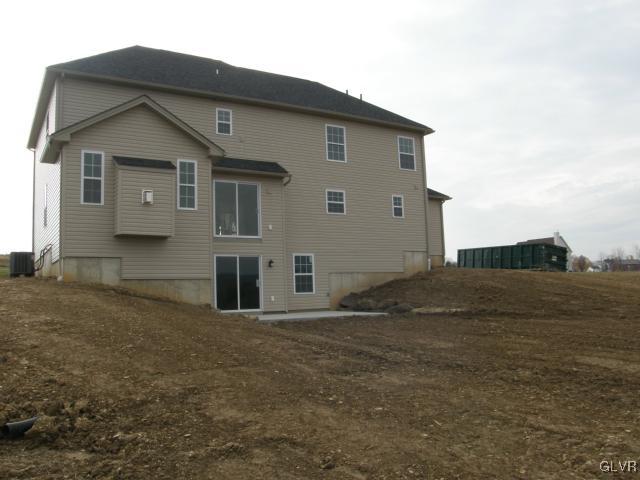 233 East Dell Road Bath, PA 18014 - Photo 3 of 13 a front view of a house with a yard