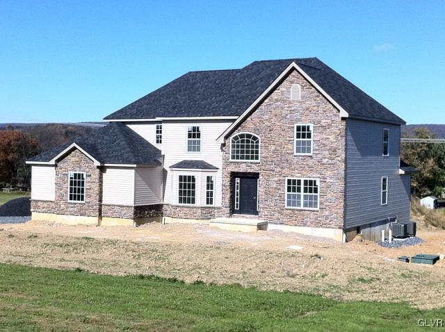 233 East Dell Road Bath, PA 18014 - Photo 8 of 13 a front view of a house with a yard