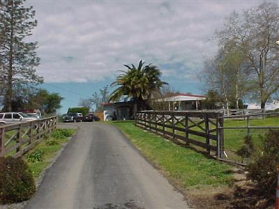 2543 Laughlin Road Windsor, CA 95492 - Photo 1 of 11 a view of a street with a houses in the background