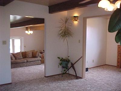 2543 Laughlin Road Windsor, CA 95492 - Photo 6 of 11 a living room with furniture and a potted plant