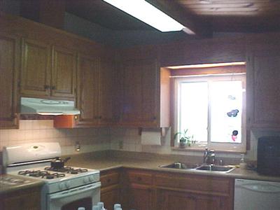 2543 Laughlin Road Windsor, CA 95492 - Photo 7 of 11 a kitchen with sink a stove and cabinets