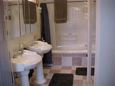 2543 Laughlin Road Windsor, CA 95492 - Photo 8 of 11 a bathroom with a sink and a mirror