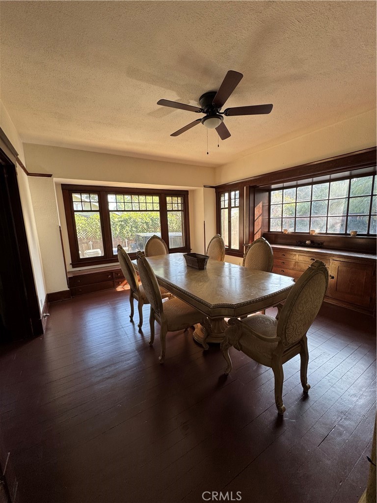 4478 4th Street Riverside, CA 92501 - Photo 12 of 51 a view of a dining room with furniture window and wooden floor