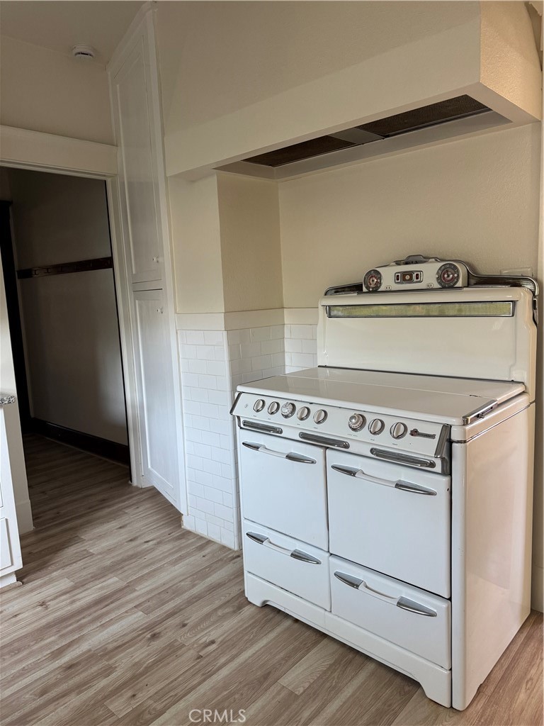 4478 4th Street Riverside, CA 92501 - Photo 16 of 51 a view of stove top oven sitting inside of a kitchen