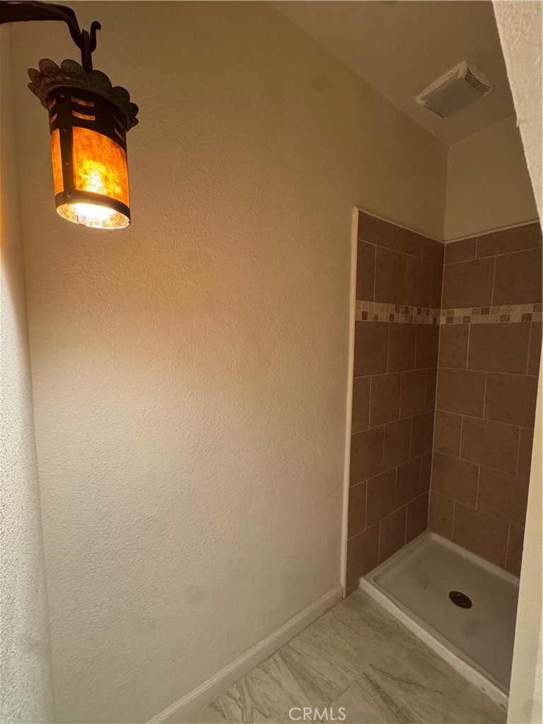 4478 4th Street Riverside, CA 92501 - Photo 18 of 51 a bathroom with a shower