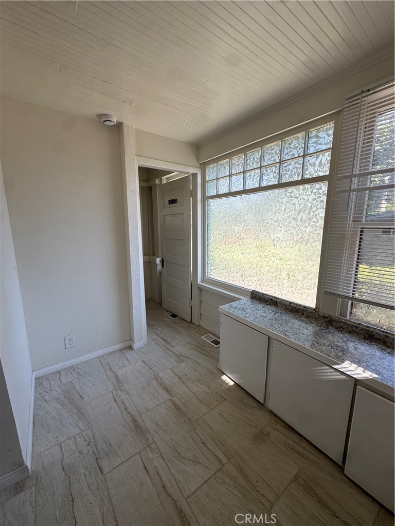 4478 4th Street Riverside, CA 92501 - Photo 19 of 51 a view of an empty room with a window
