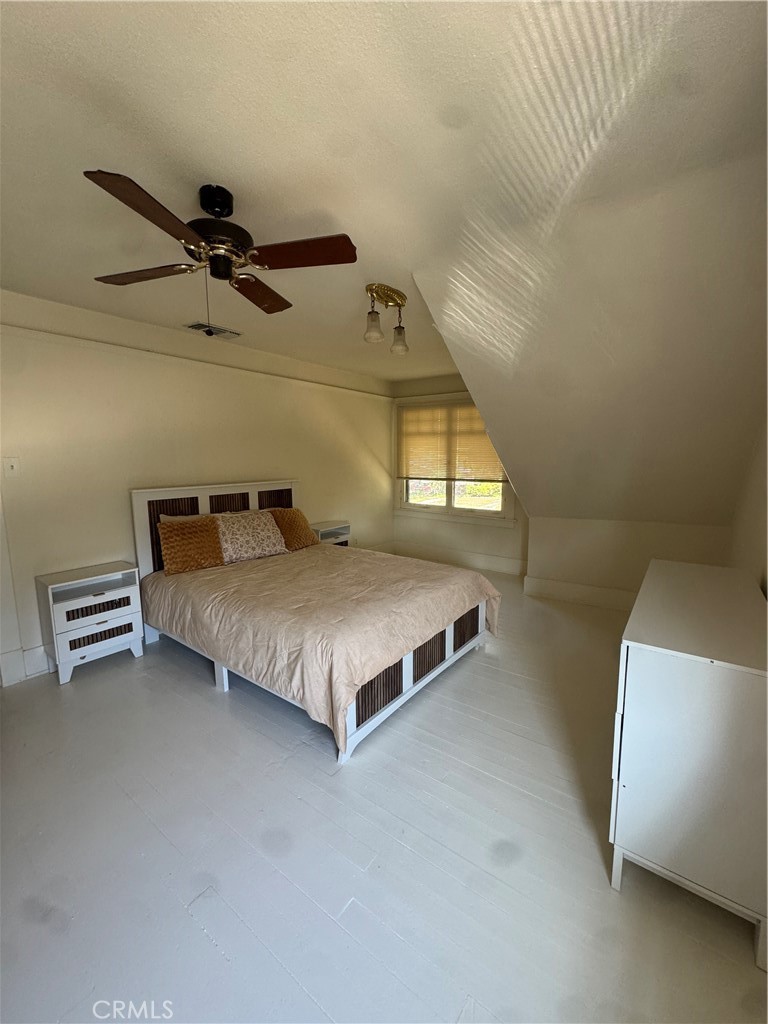 4478 4th Street Riverside, CA 92501 - Photo 25 of 51 a bedroom with a bed and window