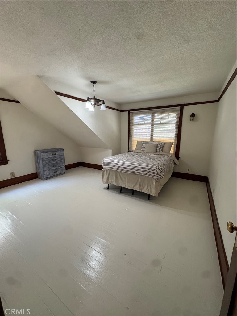 4478 4th Street Riverside, CA 92501 - Photo 27 of 51 a living room with furniture and window