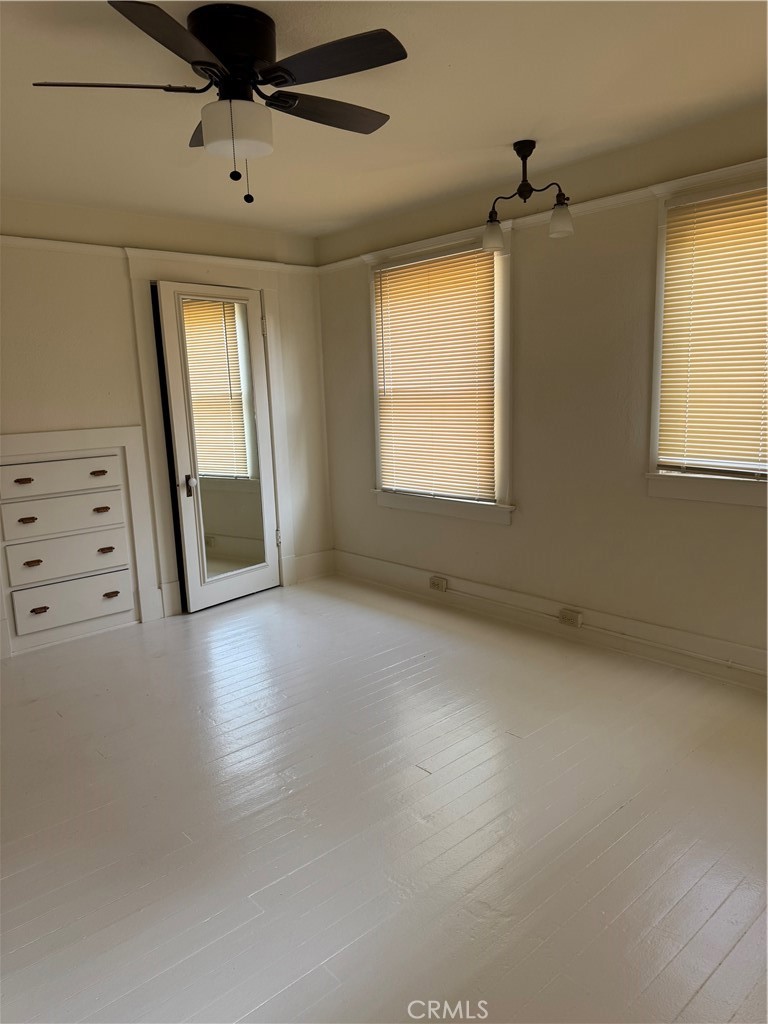 4478 4th Street Riverside, CA 92501 - Photo 29 of 51 an empty room with windows and fan