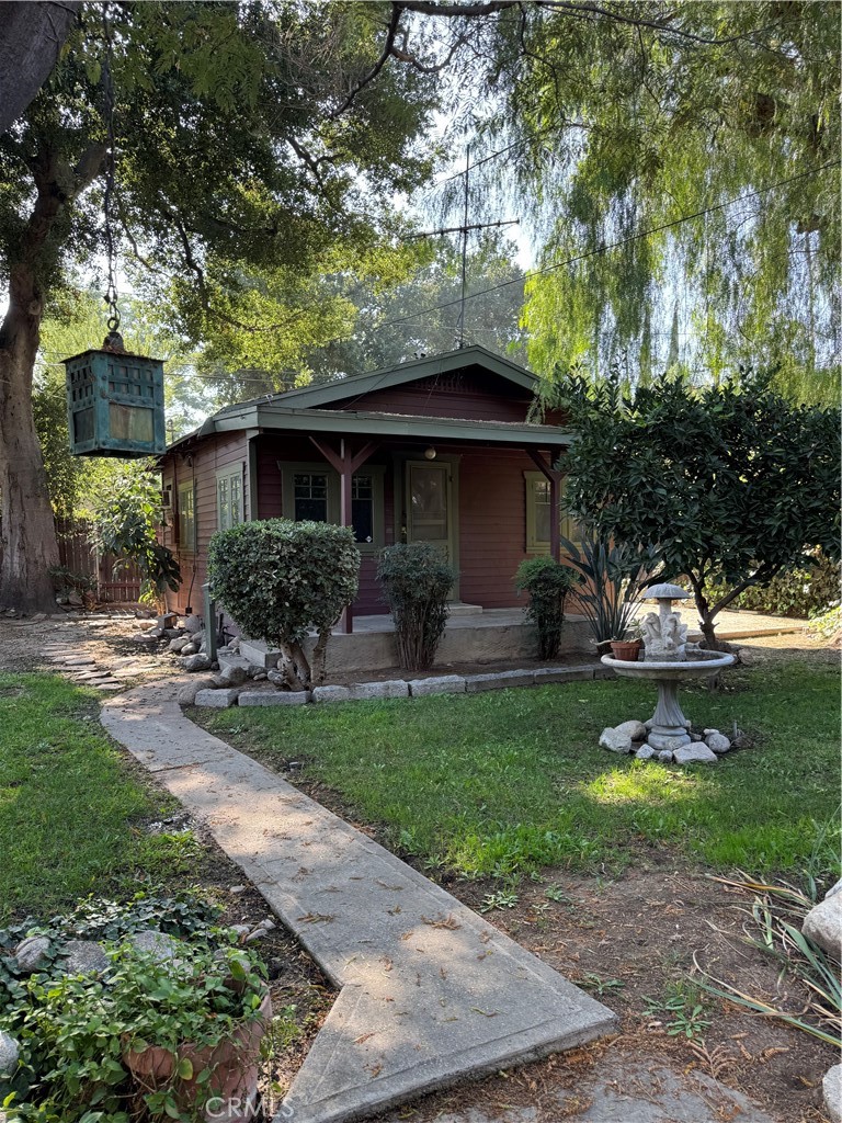 4478 4th Street Riverside, CA 92501 - Photo 38 of 51 a front view of a house with garden