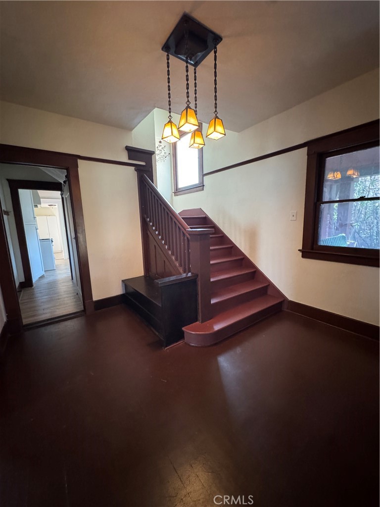 4478 4th Street Riverside, CA 92501 - Photo 5 of 51 a view of entryway and hall with wooden floor