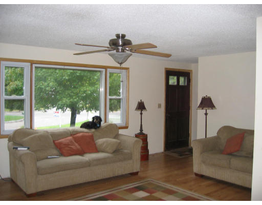 175 Keddy Street Springfield, MA 01109 - Photo 3 of 8 a living room with furniture and a large window
