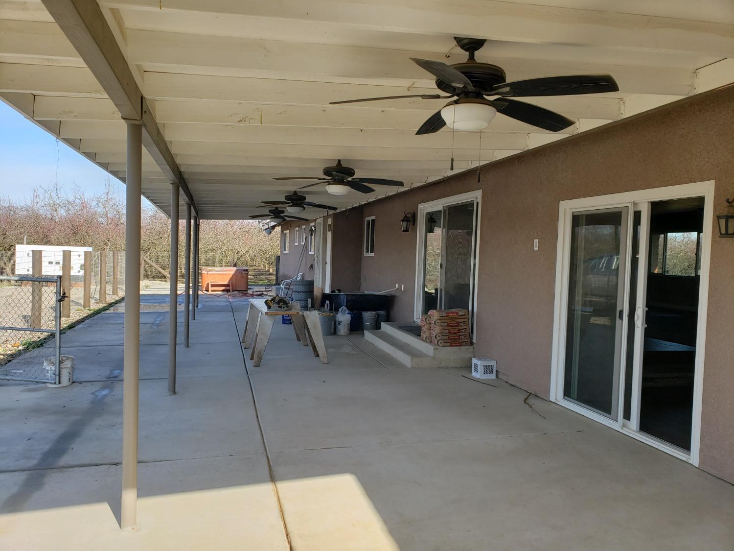5658 Road 28 Madera, CA 93637 - Photo 11 of 11 a view of a livingroom with furniture and a ceiling fan