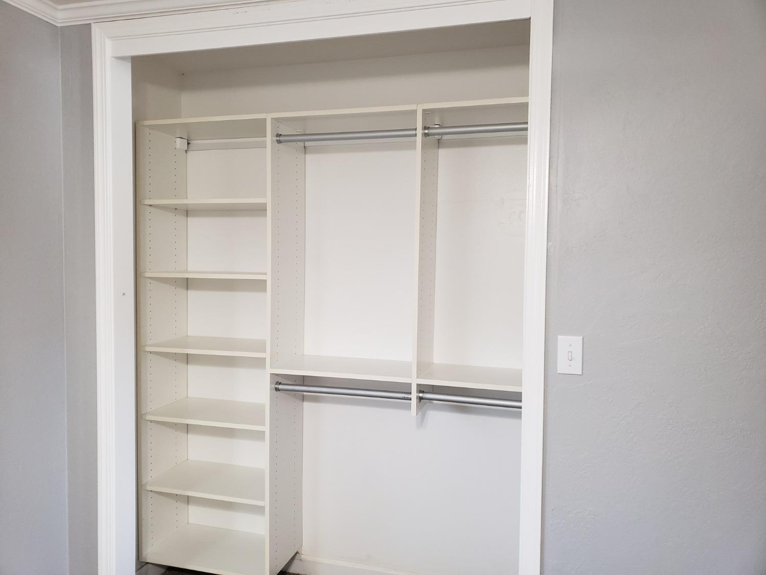 5658 Road 28 Madera, CA 93637 - Photo 8 of 11 a view of an empty walk in closet
