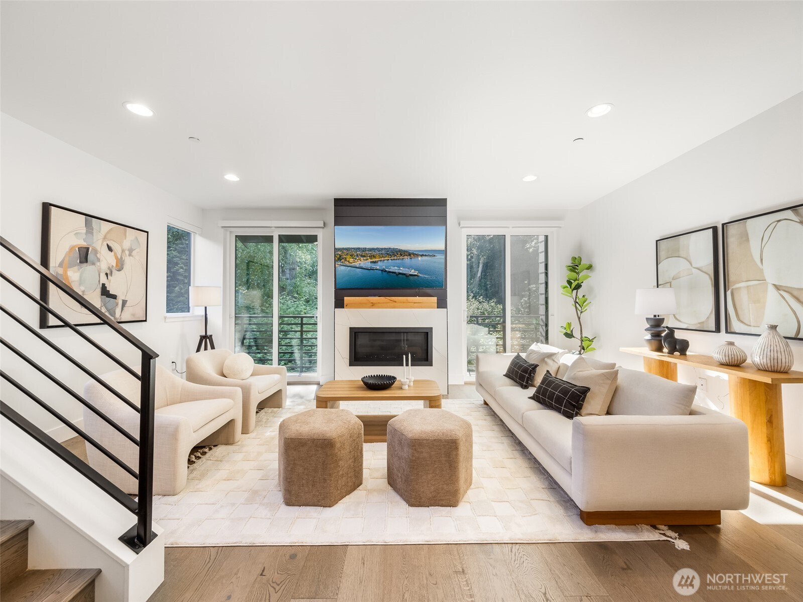 a living room with furniture large window and couch