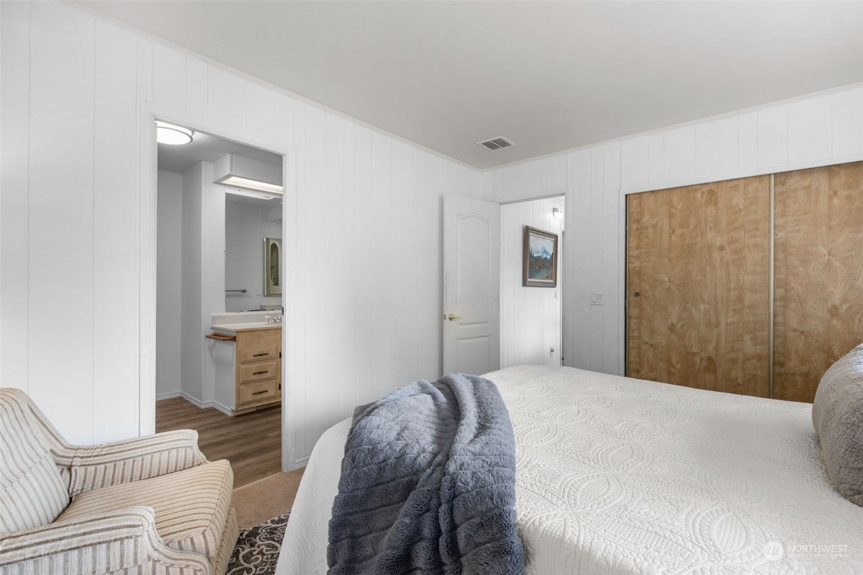 13909 Prairie Ridge Drive East Bonney Lake, WA 98391 - Photo 11 of 36 a bedroom with a bed and a couch