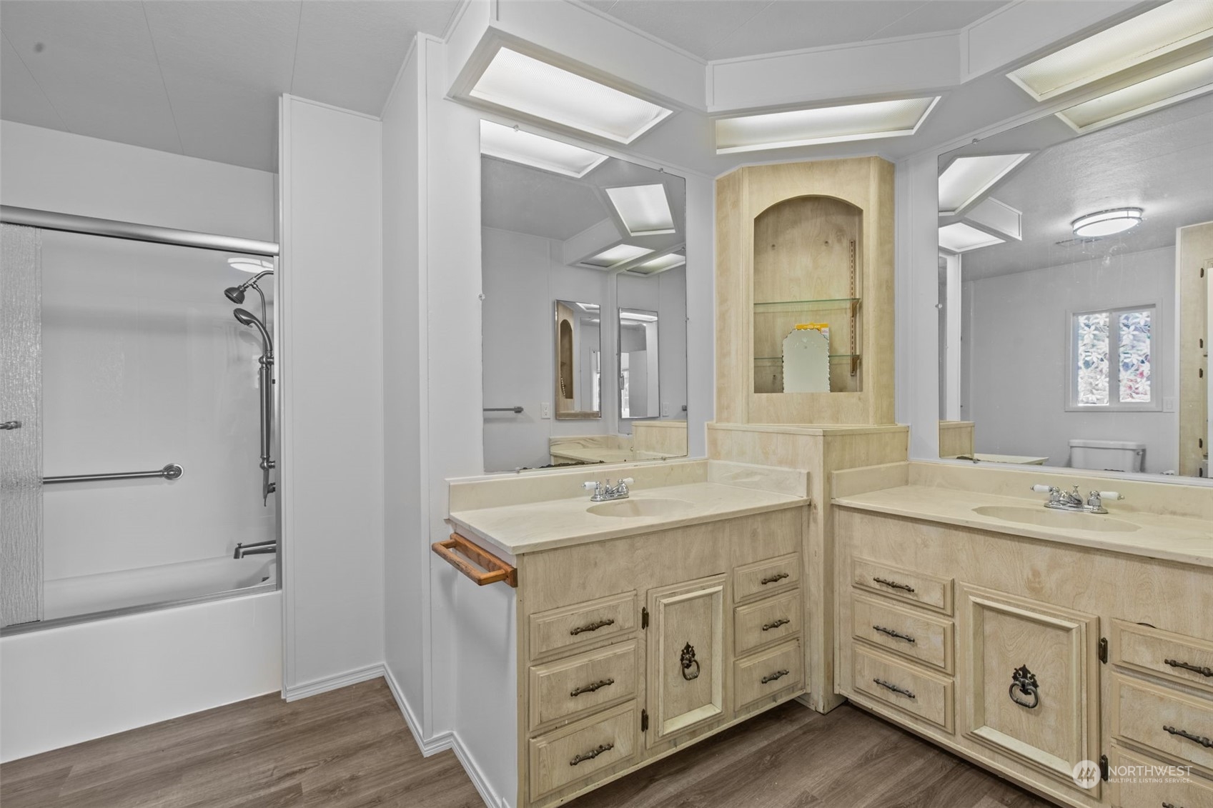 13909 Prairie Ridge Drive East Bonney Lake, WA 98391 - Photo 13 of 36 a bathroom with a double vanity sink mirror and bathtub