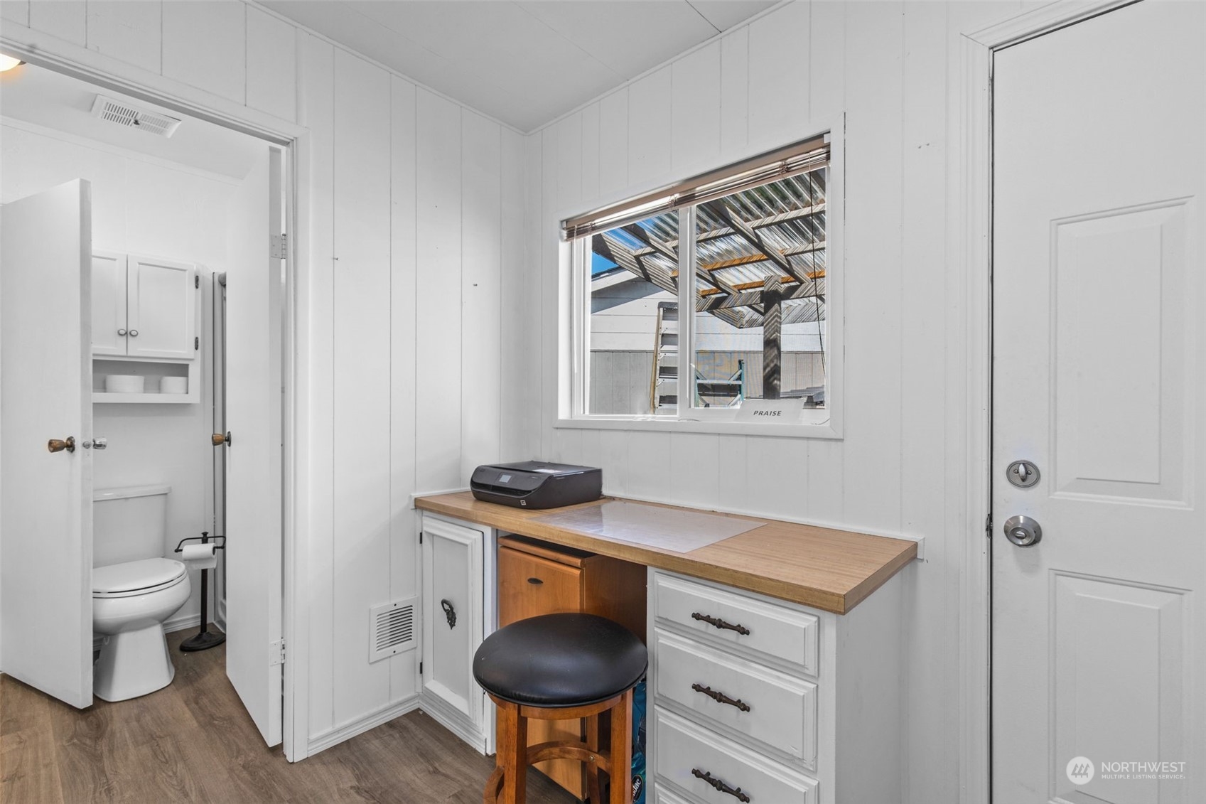 13909 Prairie Ridge Drive East Bonney Lake, WA 98391 - Photo 17 of 36 a view of bathroom with a toilet sink and a mirror