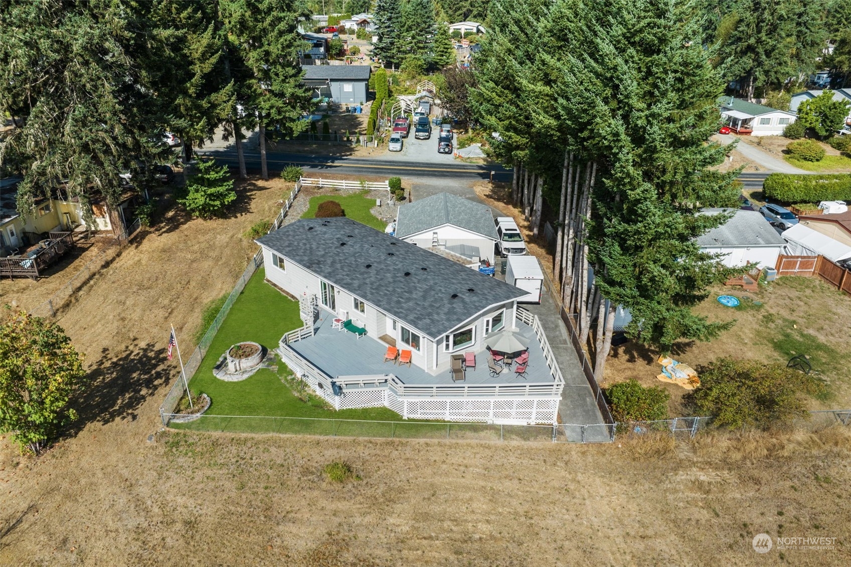 13909 Prairie Ridge Drive East Bonney Lake, WA 98391 - Photo 18 of 36 a view of a house with a yard