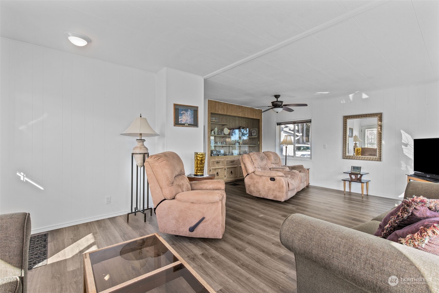 13909 Prairie Ridge Drive East Bonney Lake, WA 98391 - Photo 5 of 36 a living room with furniture and wooden floor