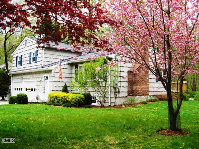 42 Shields Lane Ridgefield, CT 06877 - Photo 1 of 1 a view of a house with a backyard