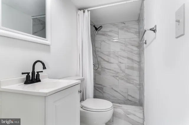 wooden floor in an empty room with wooden floor and stairs