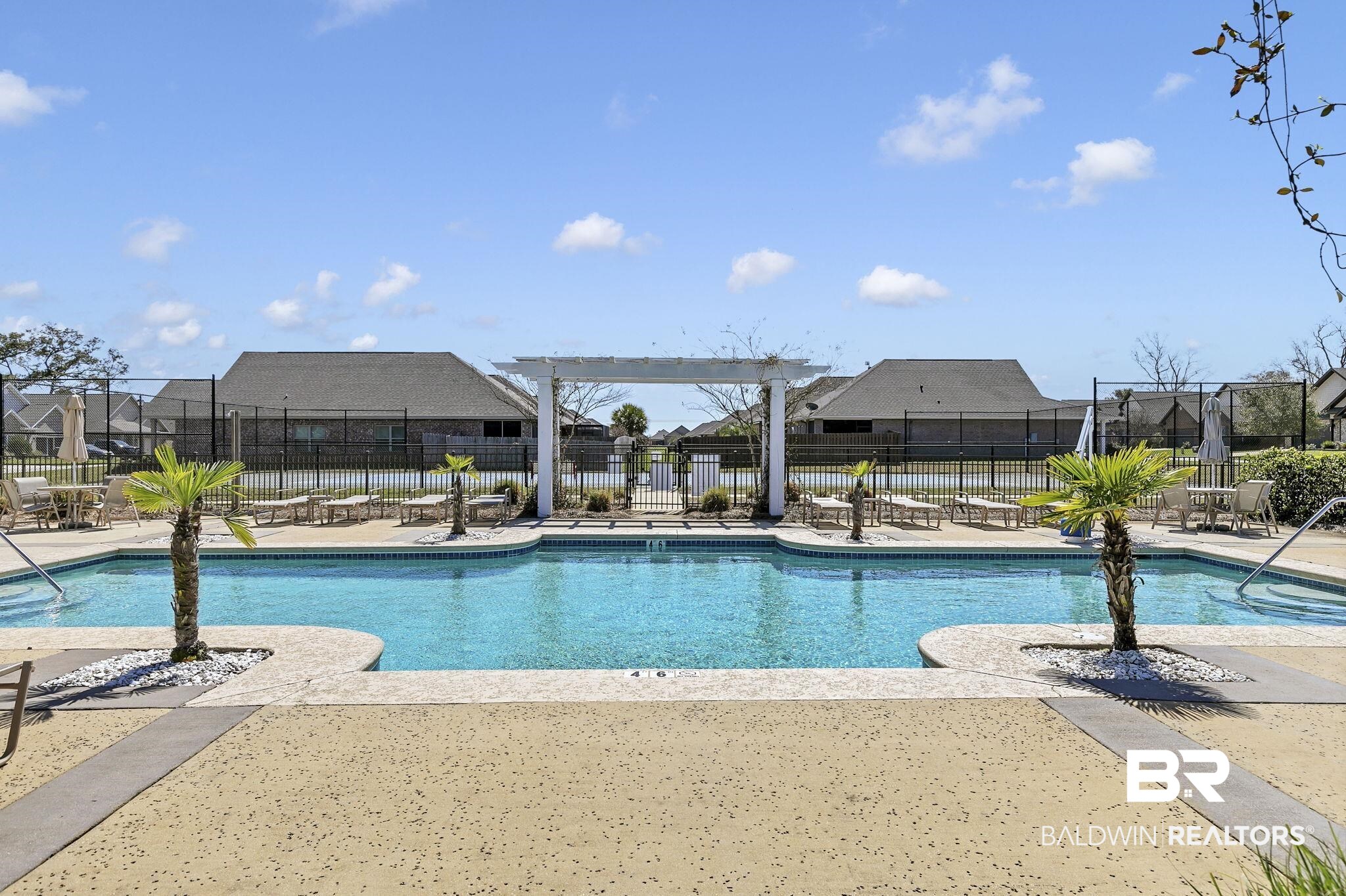 1547 Kairos Loop Foley, AL 36535 - Photo 49 of 55 Pool with a residential view, a patio, and fence