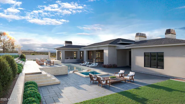 a backyard of a house with seating space