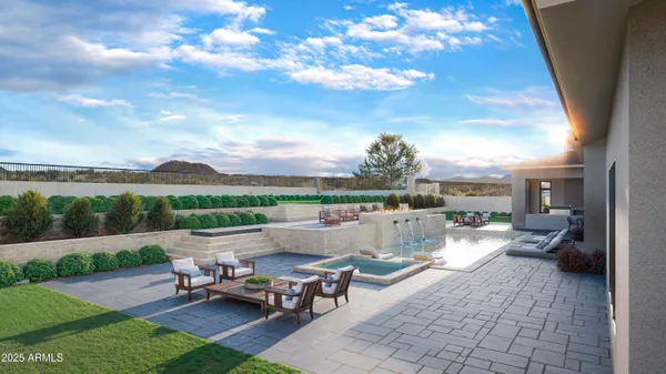 a view of a patio with couches and table and chairs and couches with wooden fence