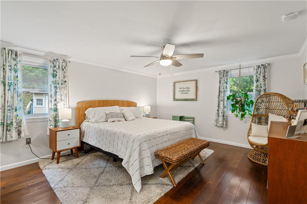 127 Berwyn Road Pittsburgh, PA 15237 - Photo 20 of 29 a bedroom with a bed and a chandelier