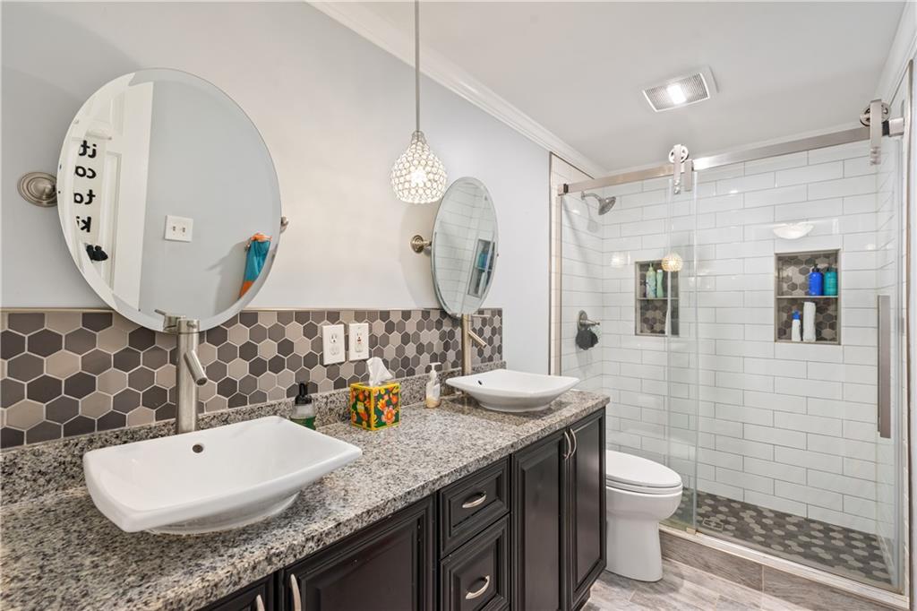 127 Berwyn Road Pittsburgh, PA 15237 - Photo 24 of 29 a bathroom with a granite countertop sink mirror and toilet