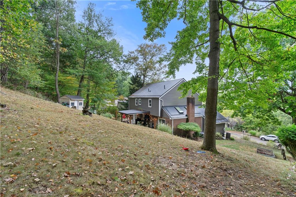 127 Berwyn Road Pittsburgh, PA 15237 - Photo 29 of 29 front view of a house with a large tree
