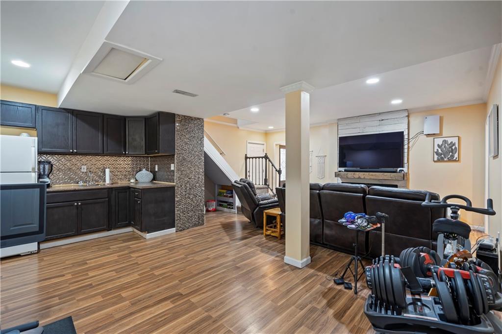 127 Berwyn Road Pittsburgh, PA 15237 - Photo 5 of 29 a kitchen with stainless steel appliances kitchen island granite countertop a refrigerator and a sink