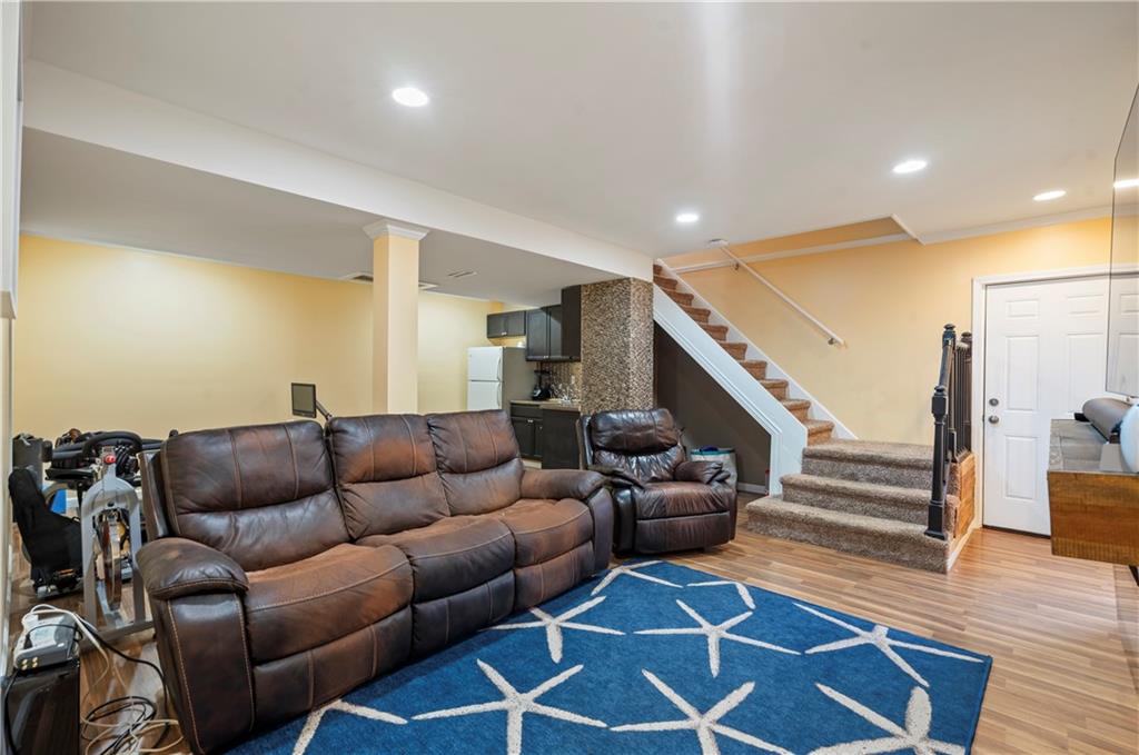 127 Berwyn Road Pittsburgh, PA 15237 - Photo 6 of 29 a living room with furniture and stairs