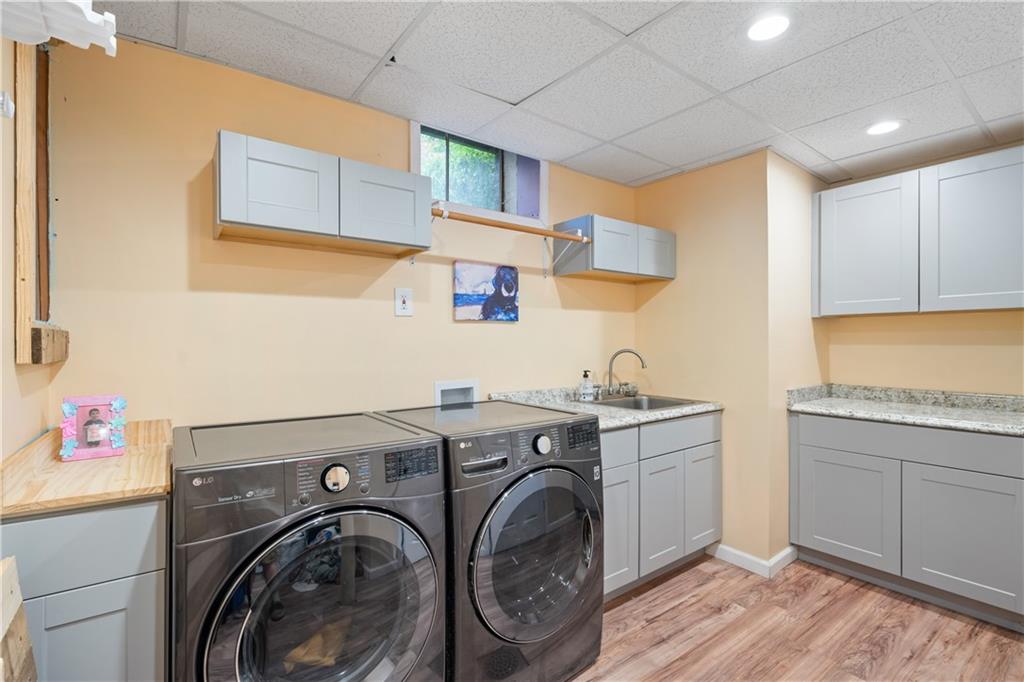 127 Berwyn Road Pittsburgh, PA 15237 - Photo 7 of 29 a utility room with sink dryer and washer
