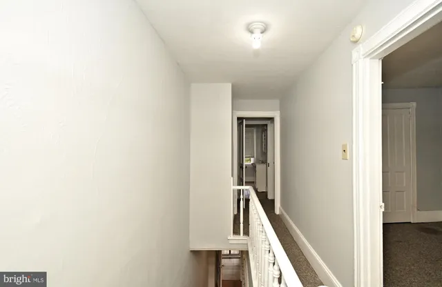 a view of entryway with a white wall