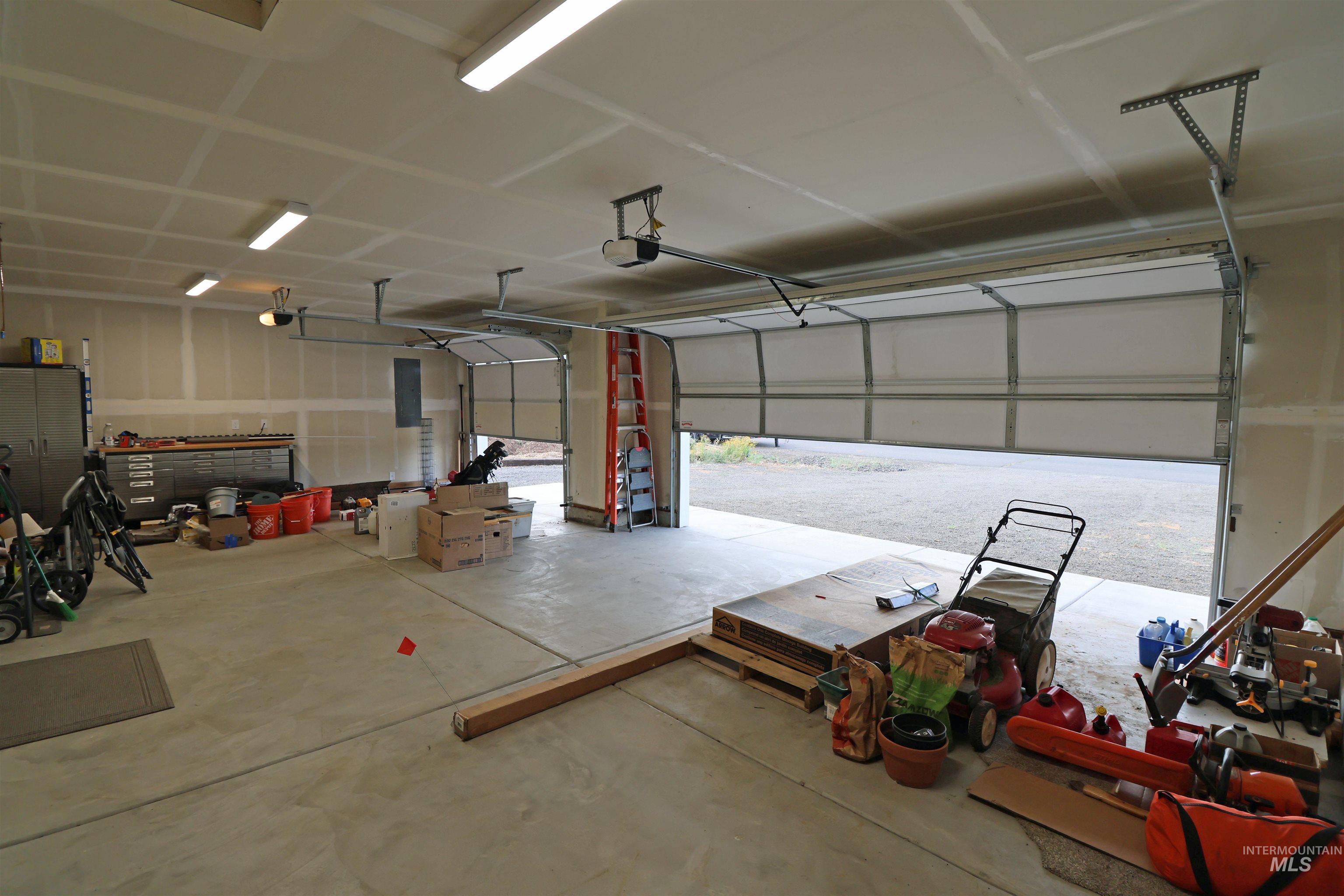 2272 Golf Lane Council, ID 83612 - Photo 23 of 32 Garage featuring a garage door opener