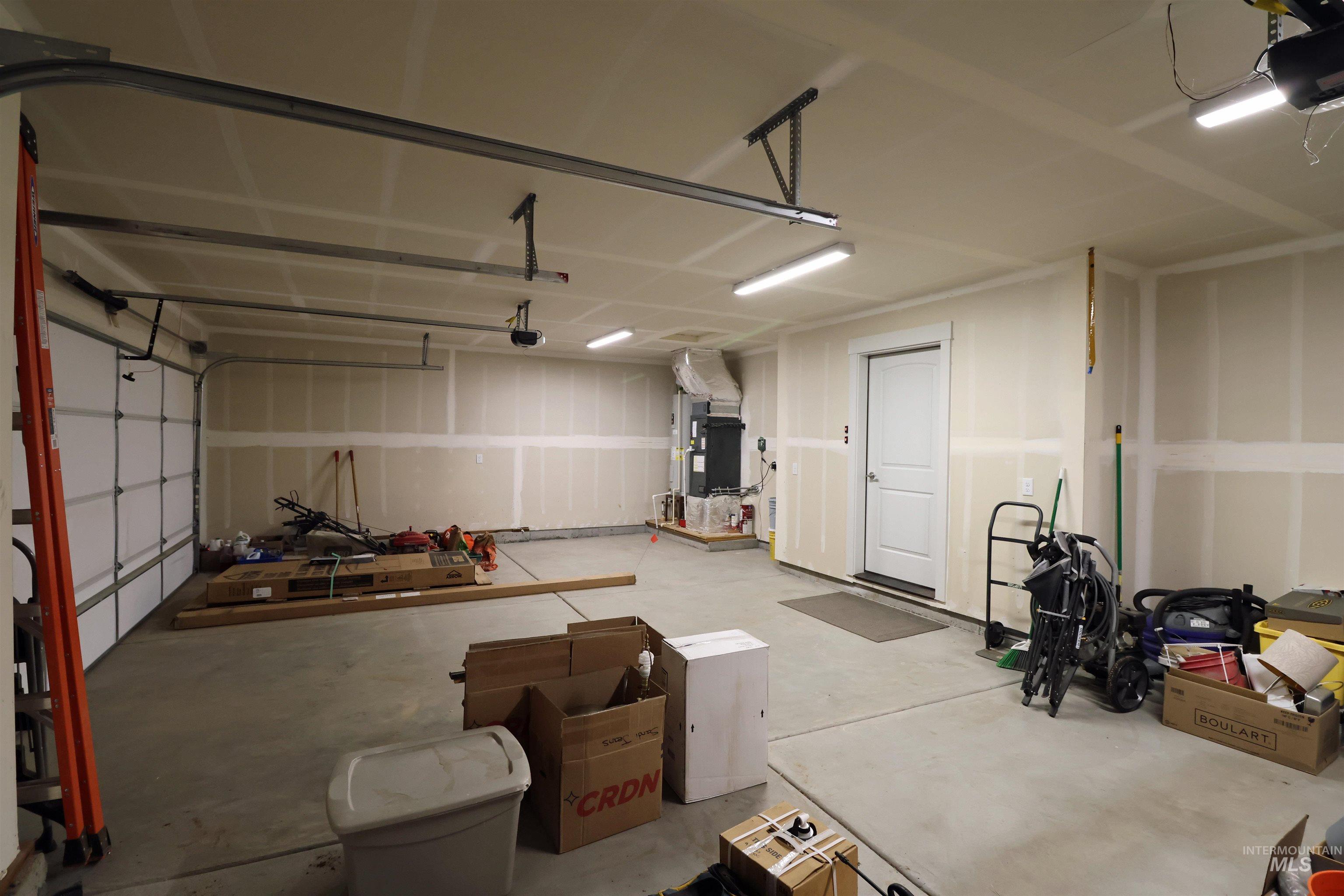 2272 Golf Lane Council, ID 83612 - Photo 24 of 32 Garage with a garage door opener