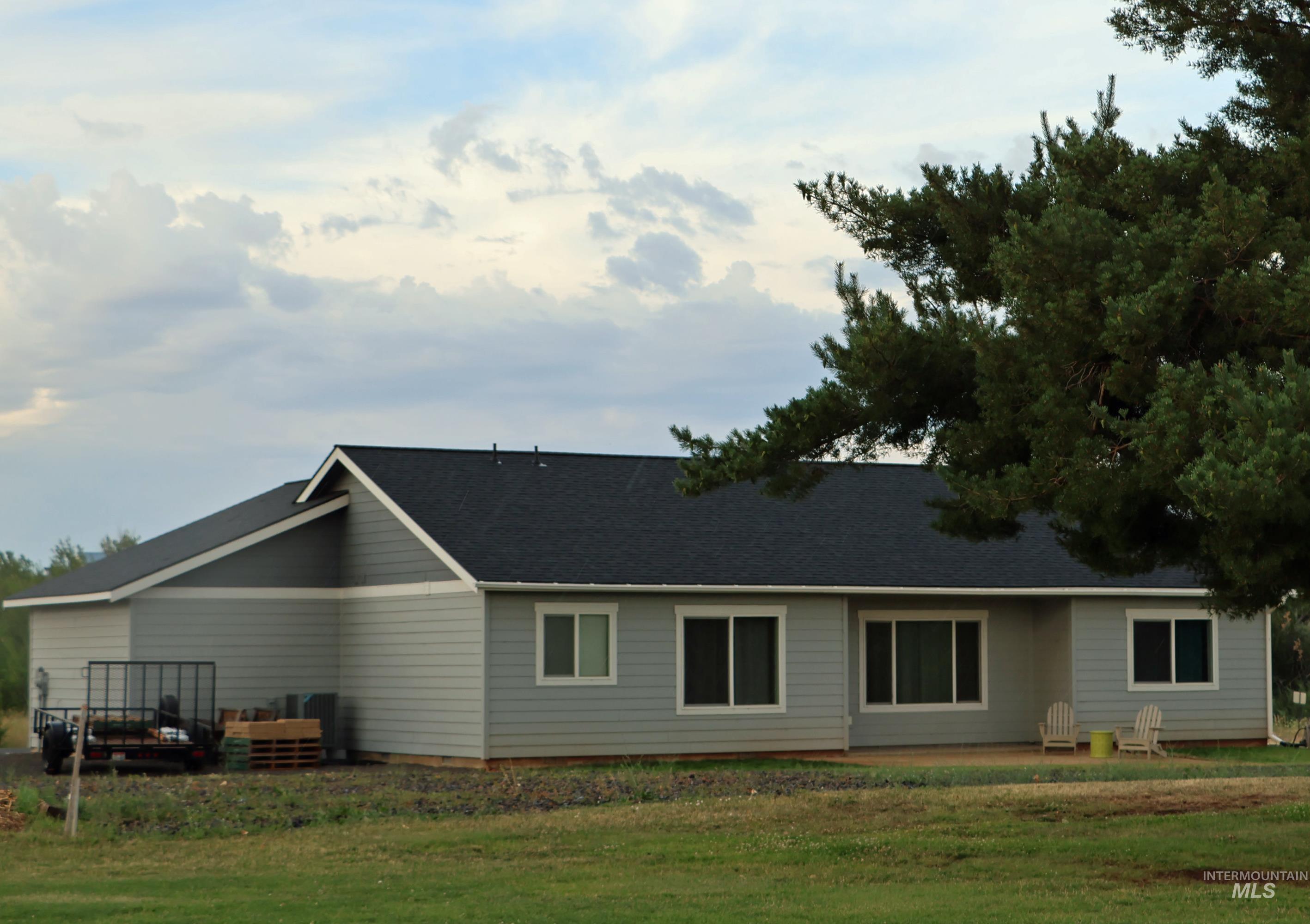 2272 Golf Lane Council, ID 83612 - Photo 3 of 32 Rear view of property featuring a yard