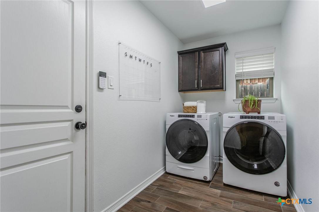 8304 Split Trl Cove Temple, TX 76502 - Photo 20 of 28 a utility room with sink dryer and washer