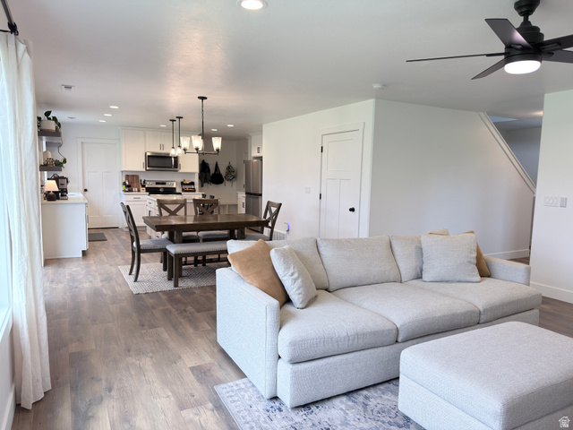 3607 South Parkinson Road South Franklin, ID 83237 - Photo 4 of 24 Living area featuring a ceiling fan, recessed lighting, and dark wood-style floors